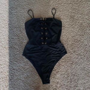 Black Bodysuit with Gold Ring Lace Up. Size small